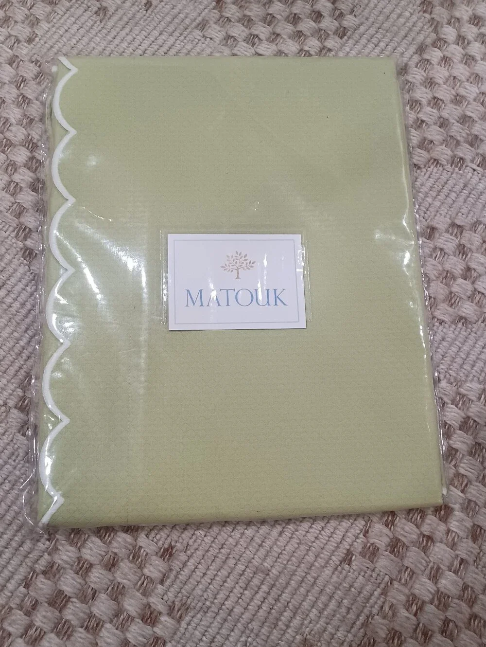 Pair of Matouk Moss Pique King Scalloped Shams.